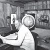 Douglas Mawson in his cabon on 'Discovery', BANZARE, 1929